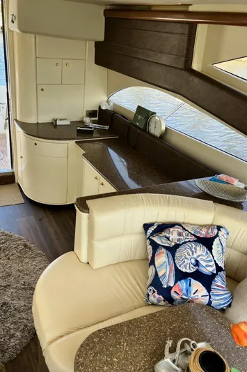 Sea Jeanie Yacht Photos Pics Interior of 1999 Viking Princess 52 Express Bridge yacht with elegant seating and decor.