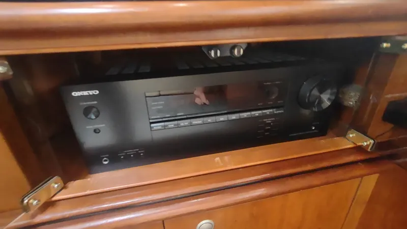  Yacht Photos Pics Onkyo audio receiver in wooden cabinet of 2001 Cruisers Yachts 4450 Express Motoryacht.