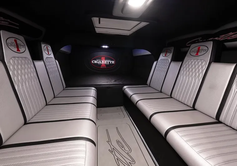  Yacht Photos Pics Luxurious interior of a 2016 Cigarette 50' Marauder boat with sleek seating.