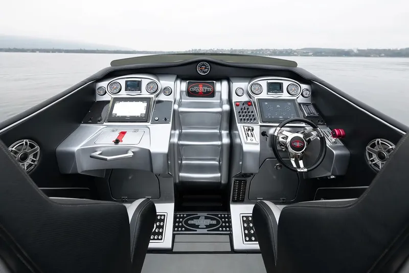  Yacht Photos Pics 2016 Cigarette 50' Marauder cockpit with advanced controls and sleek design on open water.
