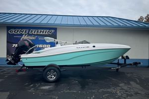 2026 Tahoe T18 boat on trailer, displayed outside a marine dealership.