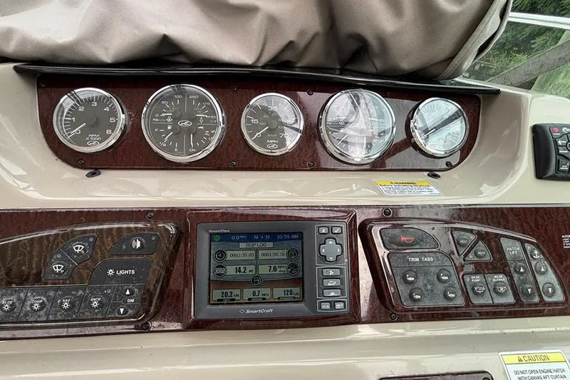  Yacht Photos Pics Dashboard of a 2011 Sea Ray 370 Sundancer with gauges and control panel.