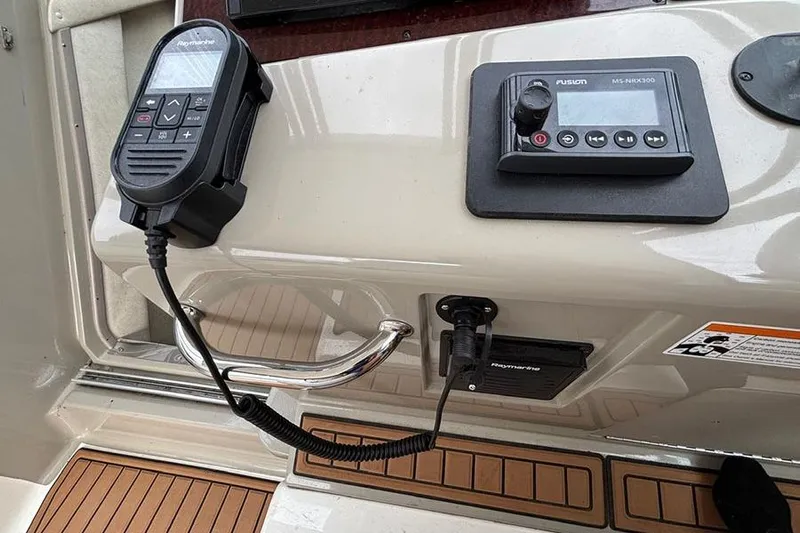  Yacht Photos Pics Control panel of a 2011 Sea Ray 370 Sundancer boat with marine electronics.