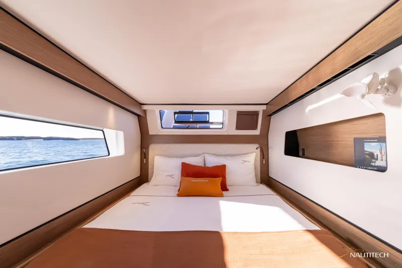 Nautitech 48 Open - Available For 2026 Delivery! Yacht Photos Pics Luxurious cabin interior of Nautitech 48 Open (2025) yacht, featuring elegant design and sea view.