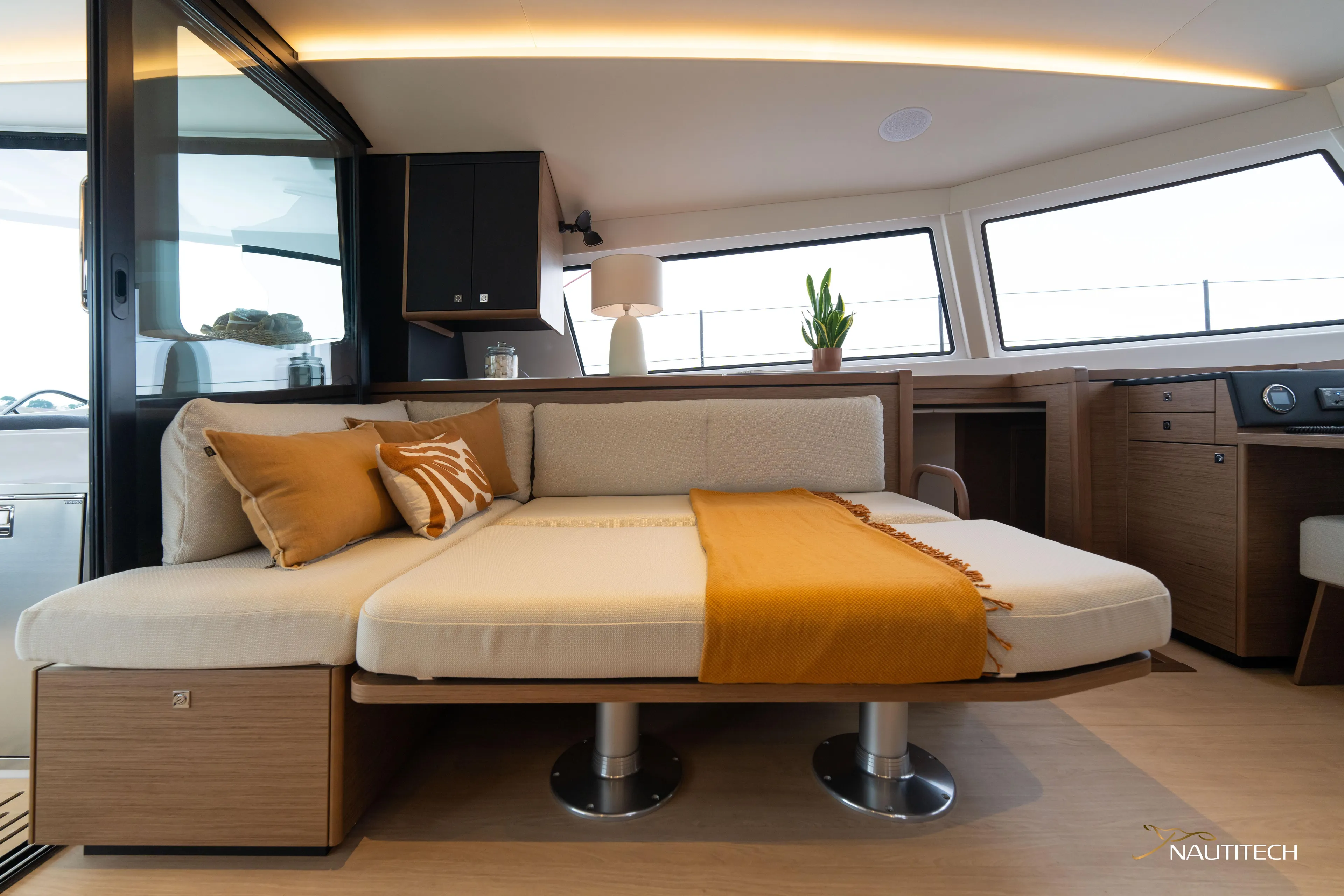 Nautitech 48 Open - Available For 2026 Delivery! Yacht Photos Pics Luxurious interior of Nautitech 48 Open 2026 yacht with modern decor and comfortable seating.