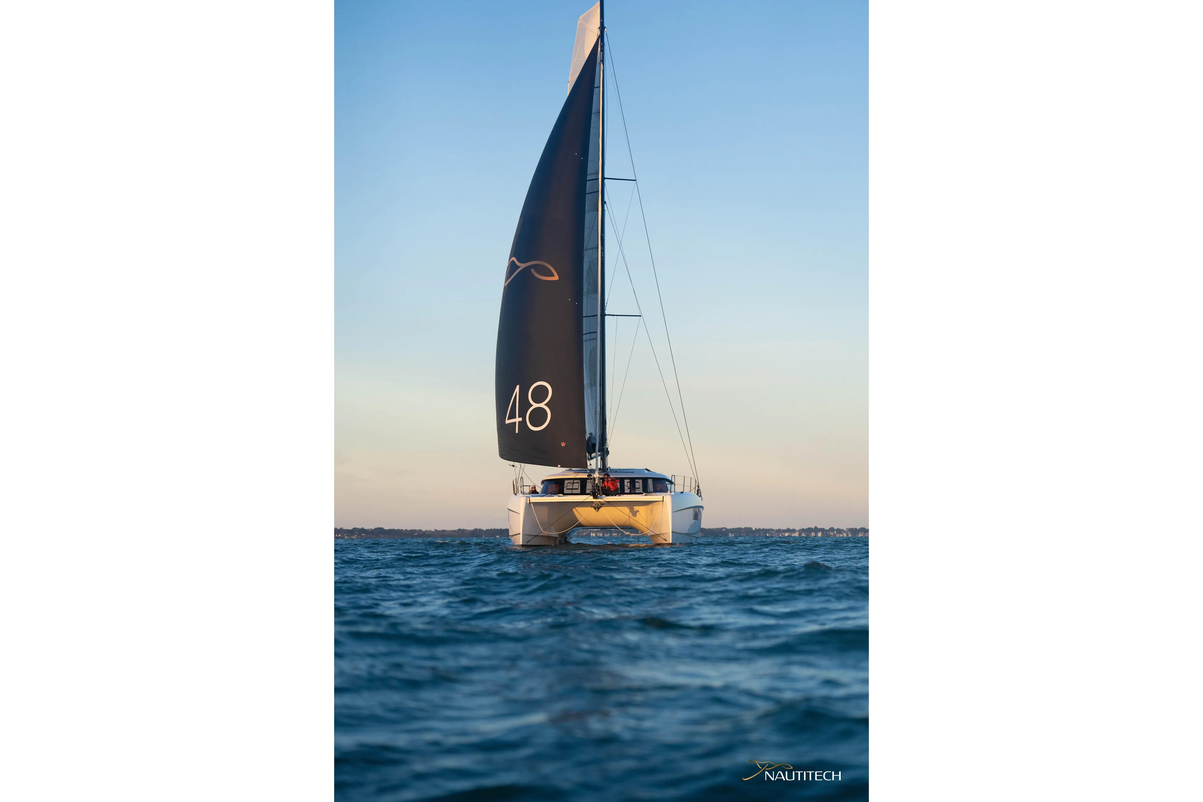 Nautitech 48 Open - Available For 2026 Delivery! Yacht Photos Pics Nautitech 48 Open (2025) sailing on open water, showcasing sleek design and modern features.