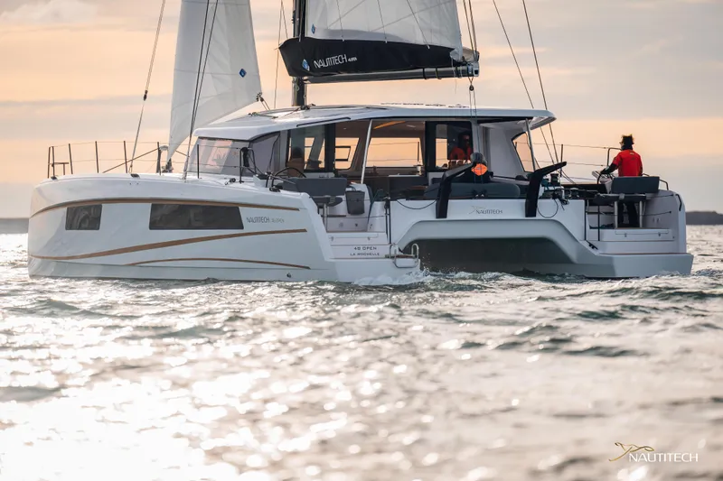 Nautitech 48 Open - Available For 2026 Delivery! Yacht Photos Pics Sailing catamaran Nautitech 48 Open (2025) on water, showcasing modern design and elegance.