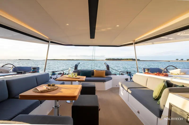 Nautitech 48 Open - Available For 2026 Delivery! Yacht Photos Pics Luxurious Nautitech 48 Open yacht interior, featuring elegant seating and ocean views.