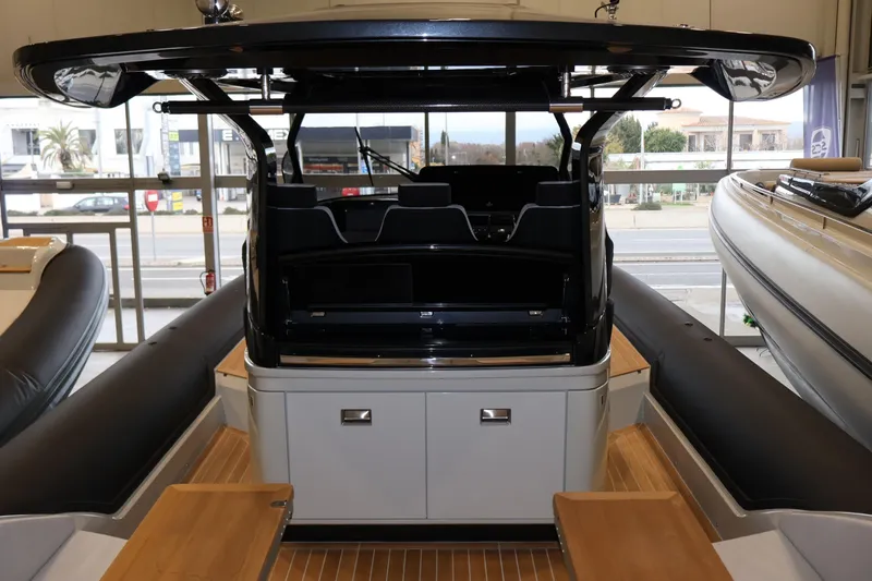  Yacht Photos Pics 2026 SACS 13 boat interior with sleek design and modern seating arrangement.