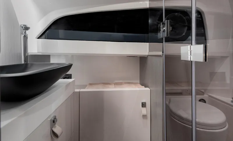  Yacht Photos Pics Luxurious bathroom interior of 2026 SACS NEW Strider 13 yacht, featuring modern fixtures and sleek design.
