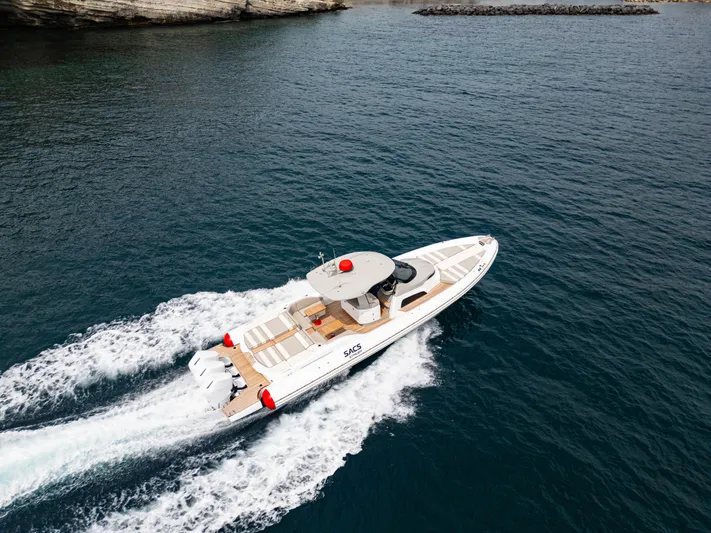  Yacht Photos Pics 2026 SACS NEW Strider 13 luxury yacht cruising on open water.