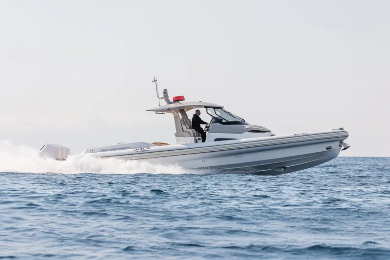  Yacht Photos Pics 2026 SACS NEW Strider 13 cruising on open water at high speed.