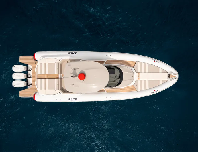 Yacht Photos Pics Top view of 2026 SACS NEW Strider 13 luxury boat on blue water.