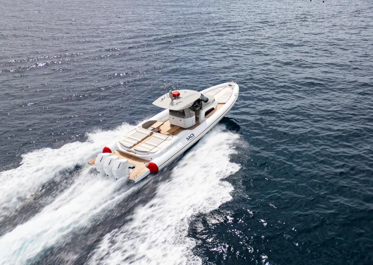  Yacht Photos Pics 2026 SACS NEW Strider 13 cruising on open water, showcasing sleek design and powerful engines.