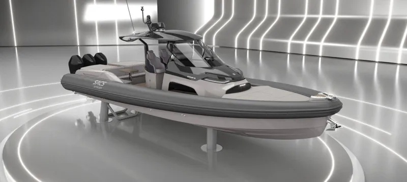  Yacht Photos Pics 2026 SACS Strider 13 luxury boat in futuristic showroom with sleek design.