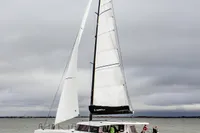 Sailing catamaran Nautitech 48 Open (2025) on the water, showcasing sleek design and performance.