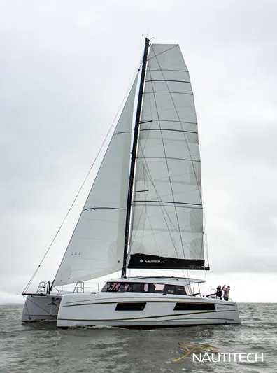 Nautitech 48 Open - Available For 2026 Delivery! Yacht Photos Pics Sailing catamaran Nautitech 48 Open 2026 on water, showcasing sleek design and modern sails.