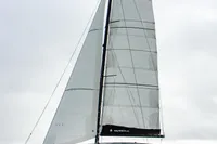 Sailing catamaran Nautitech 48 Open 2026 on water, showcasing sleek design and modern sails.