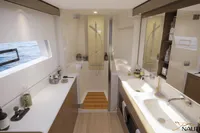 Luxurious Nautitech 48 Open 2026 yacht bathroom with modern fixtures and ocean view.