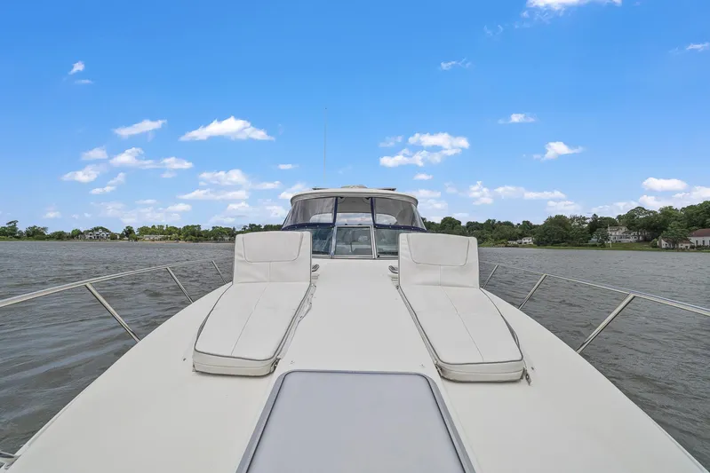  Yacht Photos Pics 2020 Formula 37 PC yacht with sun loungers on deck, cruising on a lake.