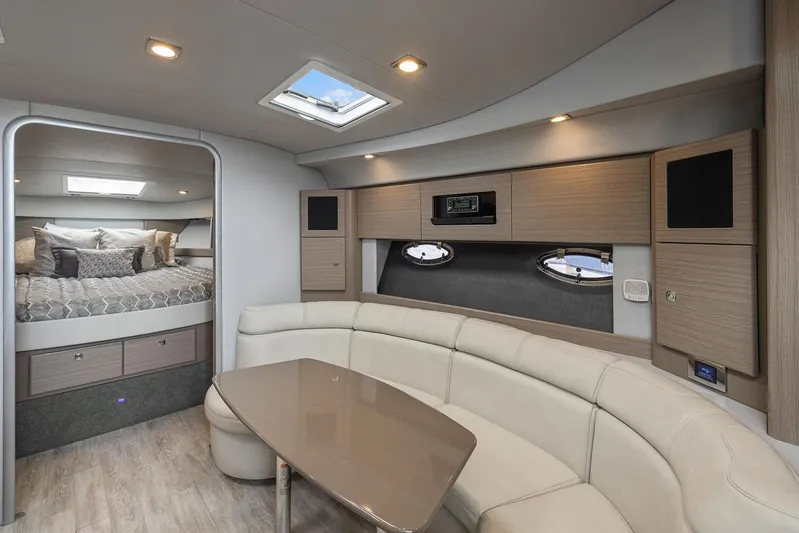  Yacht Photos Pics Luxurious interior of 2020 Formula 37 PC yacht with modern seating and bedroom.