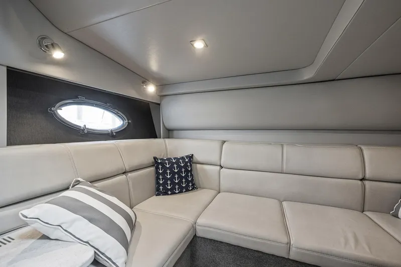  Yacht Photos Pics Luxurious interior of 2020 Formula 37 PC yacht with comfortable seating and decorative pillows.