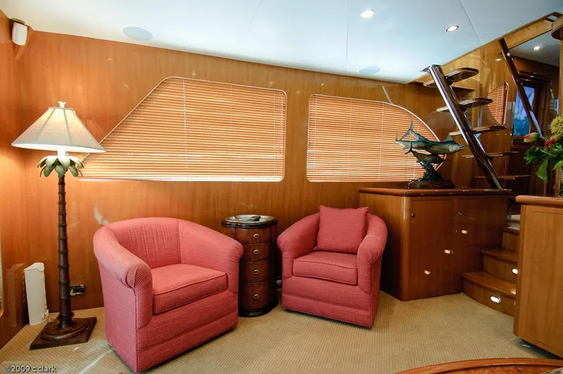 Momentum III Yacht Photos Pics Interior of 2005 Ocean Alexander 58 Motoryacht with cozy seating and elegant wood finishes.