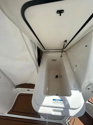 No Name Yacht Photos Pics 2019 Pursuit OS 385 Offshore boat interior storage compartment.