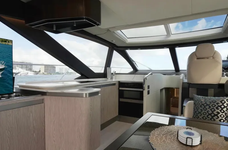  Yacht Photos Pics Luxurious interior of 2021 Azimut S6 Sports Fly yacht with modern design and panoramic windows.