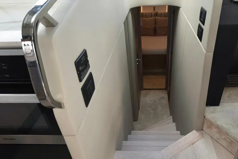  Yacht Photos Pics Staircase leading to cabin interior of 2021 Azimut S6 Sports Fly yacht.