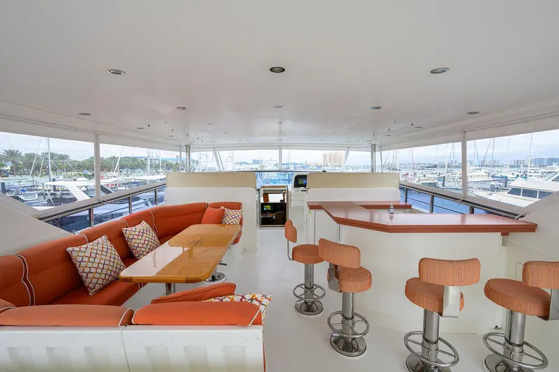 Miss Dunia Yacht Photos Pics Luxurious 2008 Hargrave Raised Pilothouse yacht interior with seating and bar area.