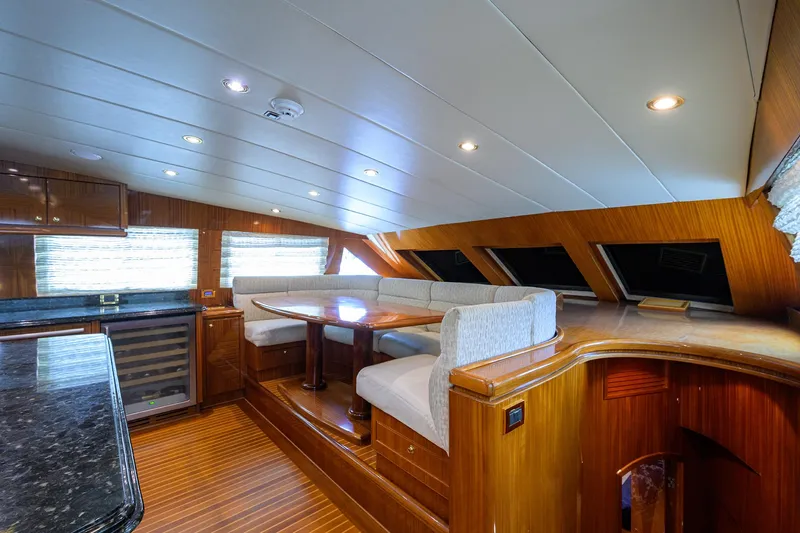 Miss Dunia Yacht Photos Pics Luxurious 2008 Hargrave Raised Pilothouse interior with elegant wood finishes and cozy seating area.