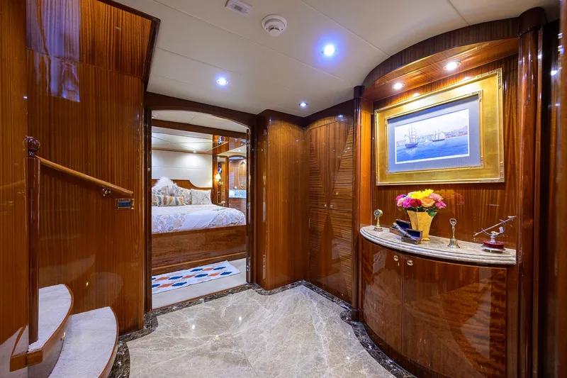 Miss Dunia Yacht Photos Pics Luxurious interior of 2008 Hargrave Raised Pilothouse yacht with elegant wood finishes and decor.
