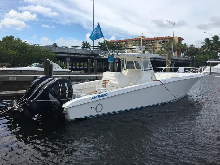  Yacht Photos Pics 2007 Fountain 38 Tournament Edition boat docked in harbor.
