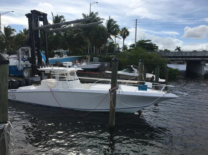  Yacht Photos Pics 2007 Fountain 38 Tournament Edition boat docked in harbor.