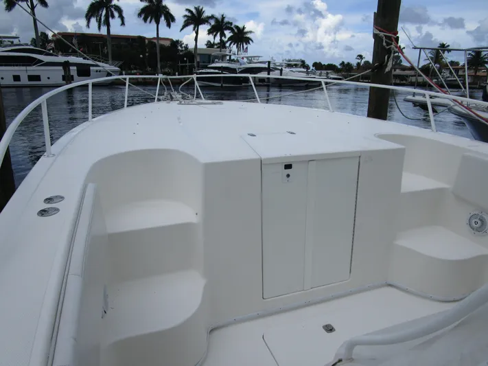  Yacht Photos Pics Fountain 38 Tournament Edition 2007 on calm water with palm trees in background.