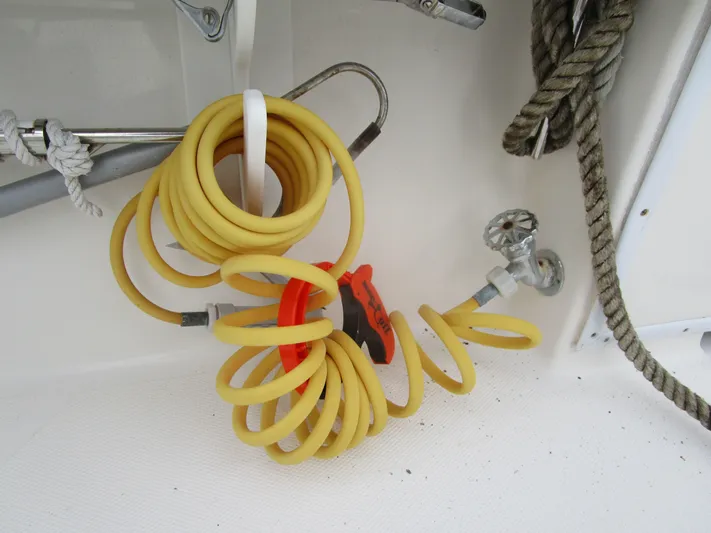  Yacht Photos Pics Yellow hose and rope on a 2007 Fountain 38 boat.
