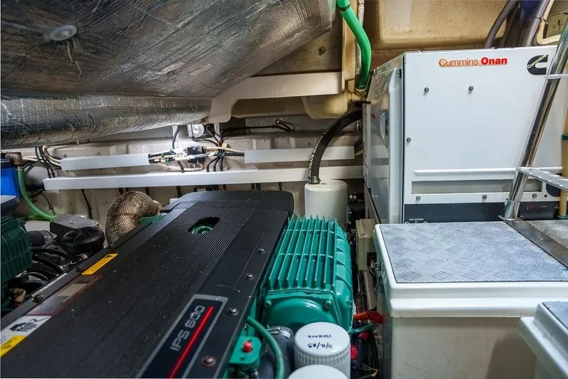 Aquaholic Yacht Photos Pics Engine room of 2013 Sunseeker Portafino yacht with Cummins Onan generator and IPS 600 engine.