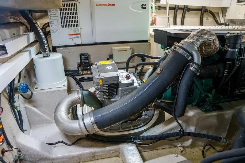 Aquaholic Yacht Photos Pics Engine room of 2013 Sunseeker Portafino yacht with Cummins Onan generator.