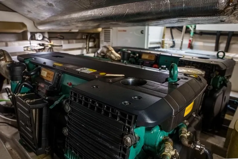 Aquaholic Yacht Photos Pics Engine room of a 2013 Sunseeker Portafino yacht, showcasing powerful machinery.