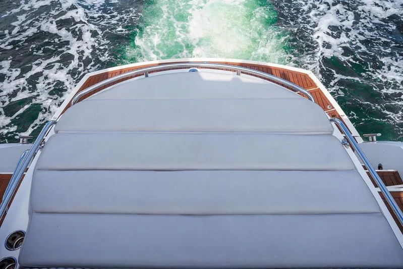 Aquaholic Yacht Photos Pics Sunseeker Portafino 2013 yacht deck with ocean waves in the background.