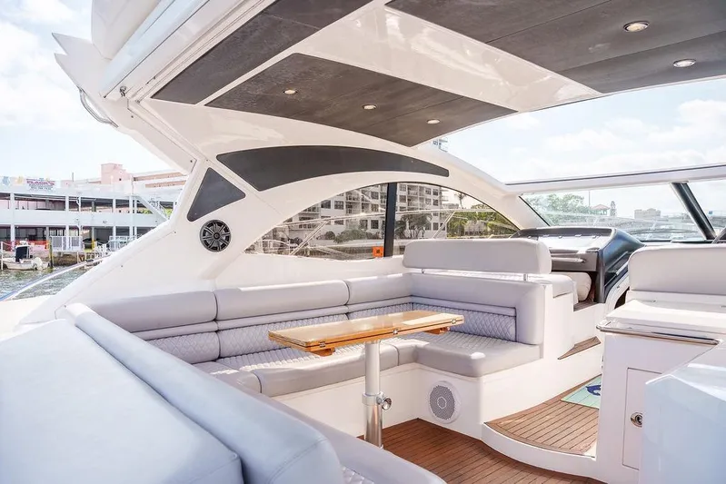 Aquaholic Yacht Photos Pics Luxurious 2013 Sunseeker Portafino yacht interior with elegant seating and modern design.