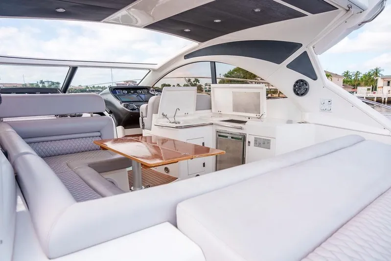 Aquaholic Yacht Photos Pics Luxurious 2013 Sunseeker Portafino yacht interior with modern seating and sleek design.