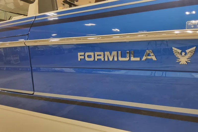  Yacht Photos Pics 2024 Formula 387 Center Console Fish boat, blue exterior with logo detail.