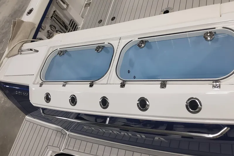  Yacht Photos Pics 2024 Formula 387 Center Console Fish boat with sleek deck and storage compartments.