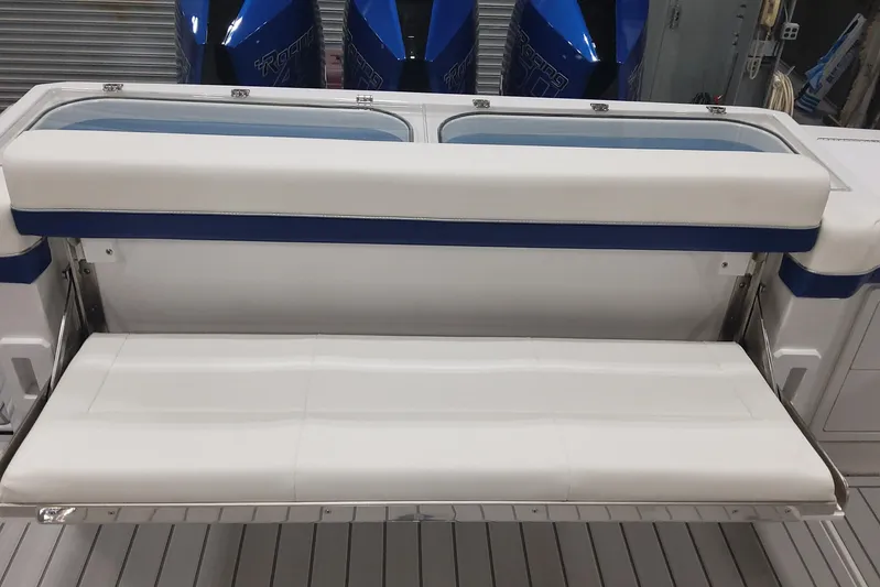  Yacht Photos Pics 2024 Formula 387 Center Console Fish boat with white and blue seating.