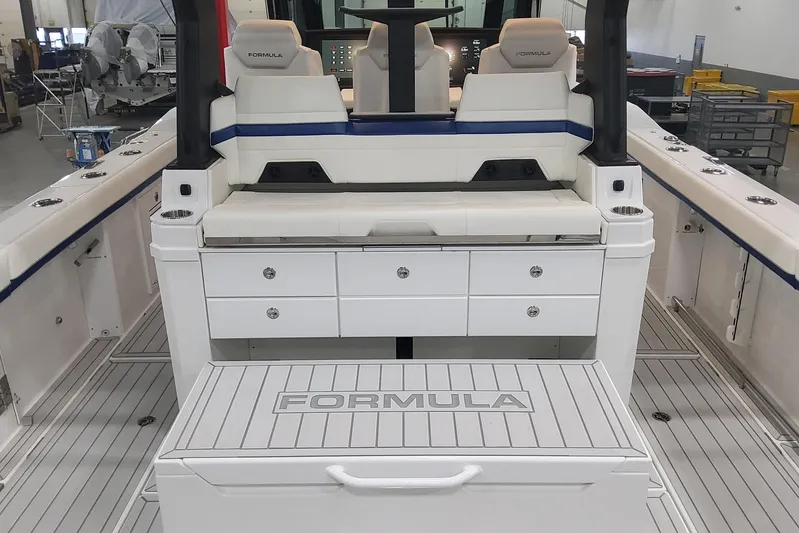  Yacht Photos Pics 2024 Formula 387 Center Console Fish boat interior with seating and storage.