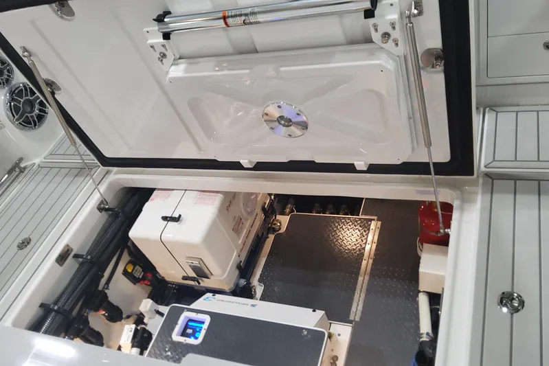  Yacht Photos Pics 2024 Formula 387 Center Console Fish engine compartment with advanced equipment and sleek design.