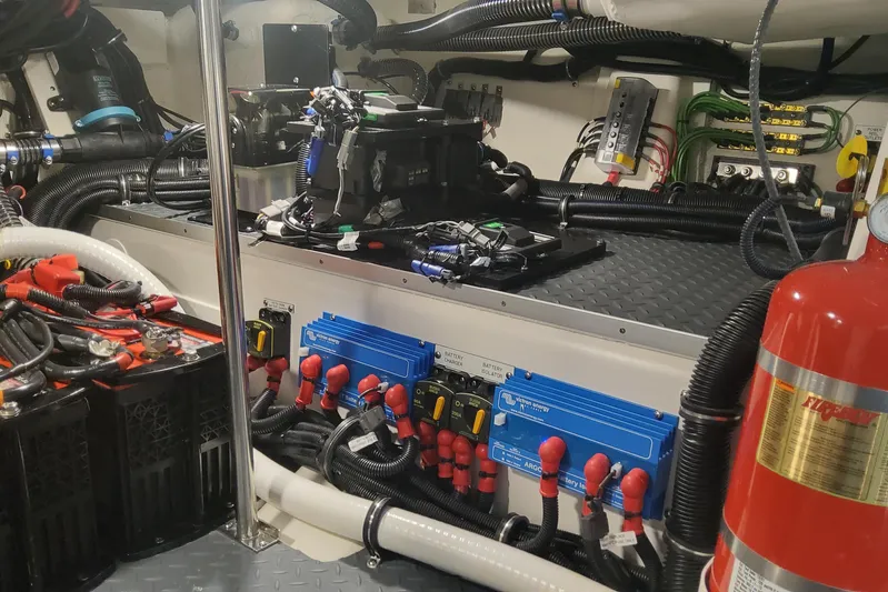  Yacht Photos Pics Engine room of 2024 Formula 387 Center Console Fish, showcasing electrical systems and components.