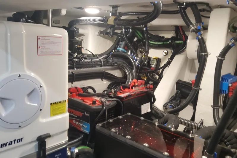  Yacht Photos Pics Engine room of 2024 Formula 387 Center Console Fish with complex wiring and equipment.